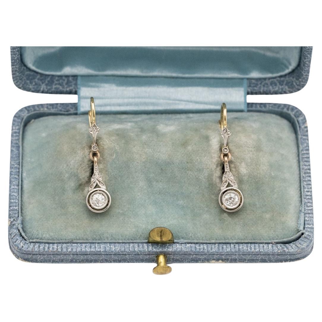 Old gold and platinum earrings with diamonds, first half of the 20th century.
