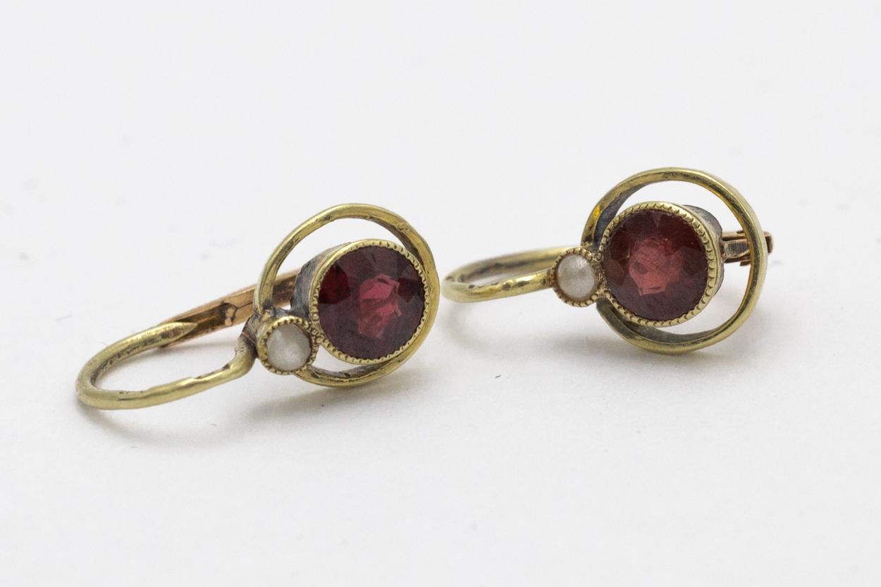 Round Cut Old gold earrings with garnets, Austria-Hungary, early 20th century.