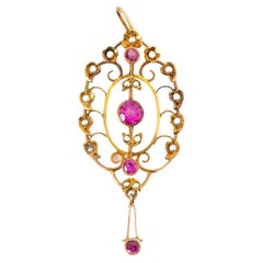Retro Old gold pendant with synthetic rubies and pearls