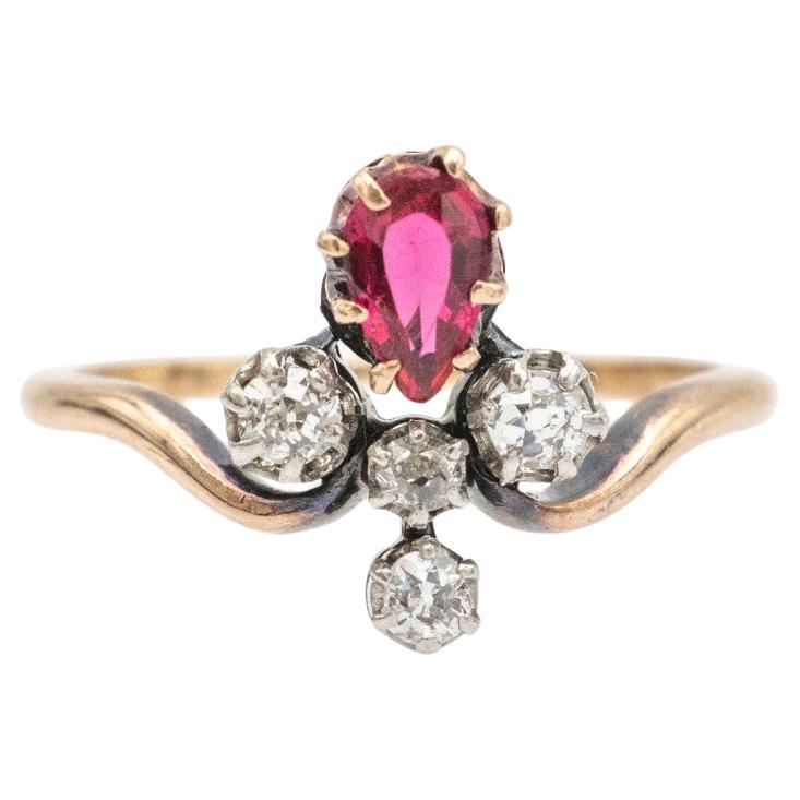 Old gold ring with diamonds and synthetic corundum