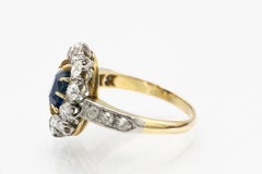 Old gold ring with oval natural sapphire and diamonds, early 20th century.