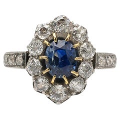 Old gold ring with oval natural sapphire and diamonds, early 20th century. Old gold ring with oval natural sapphire and diamonds, early 20th century.
