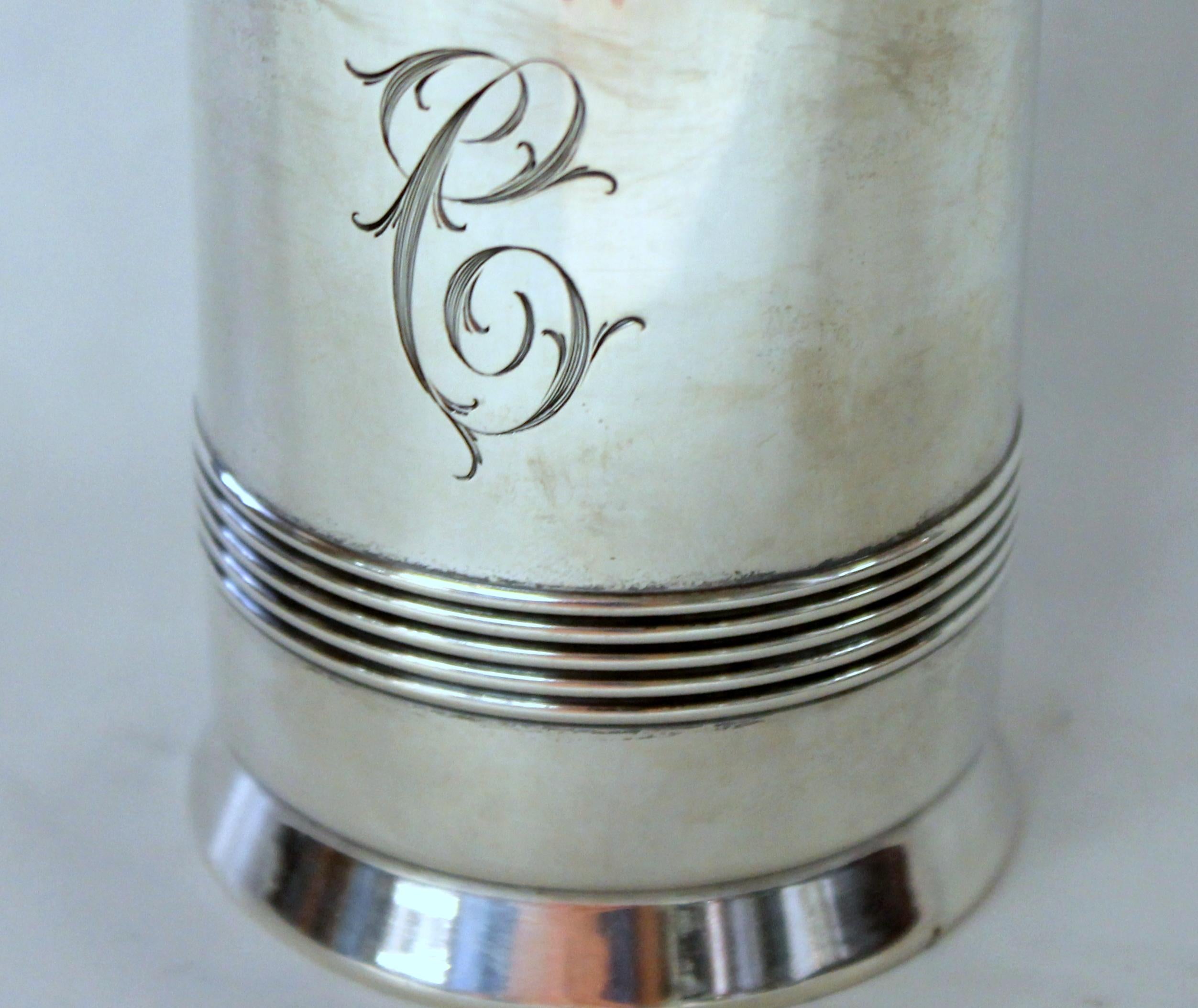 Superb Old Gorham sterling silver cylindrical or bullet-shaped sugar dredger, muffineer or shaker.

Made by Gorham Manufacturing Company for S. Kind & Son (Philadelphia). 

Approx. 7 troy ounces. Fabulous hand engraved monogrammed 