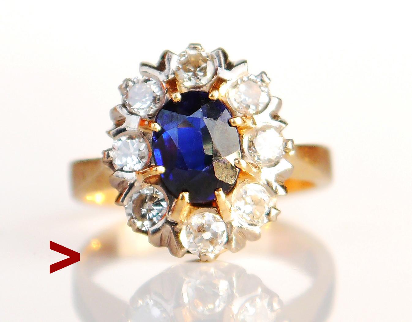 Halo Ring in solid 18K Yellow Gold with natural Blue Sapphire and 8 old European cut Diamonds set in Platinum settings.

Hallmarked 18K, tested 18K Yellow Gold, European made ca 1930s - 1950s.

The floret/ crown measures 14 mm x 12 mm x 8 mm deep.