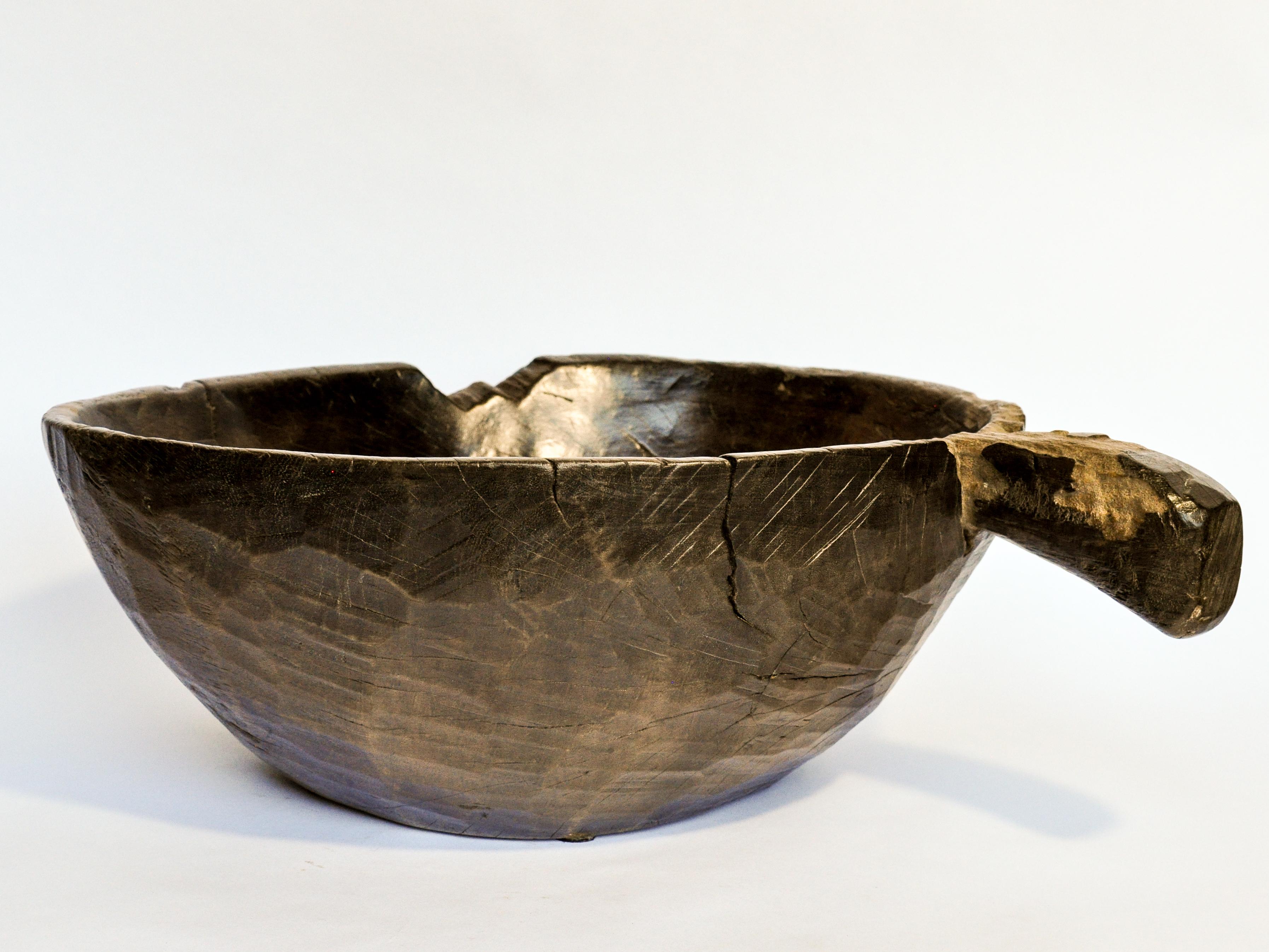 Tribal Old Hand Hewn Wooden Bowl with Handle from Sulawesi, Indonesia, Mid-20th Century