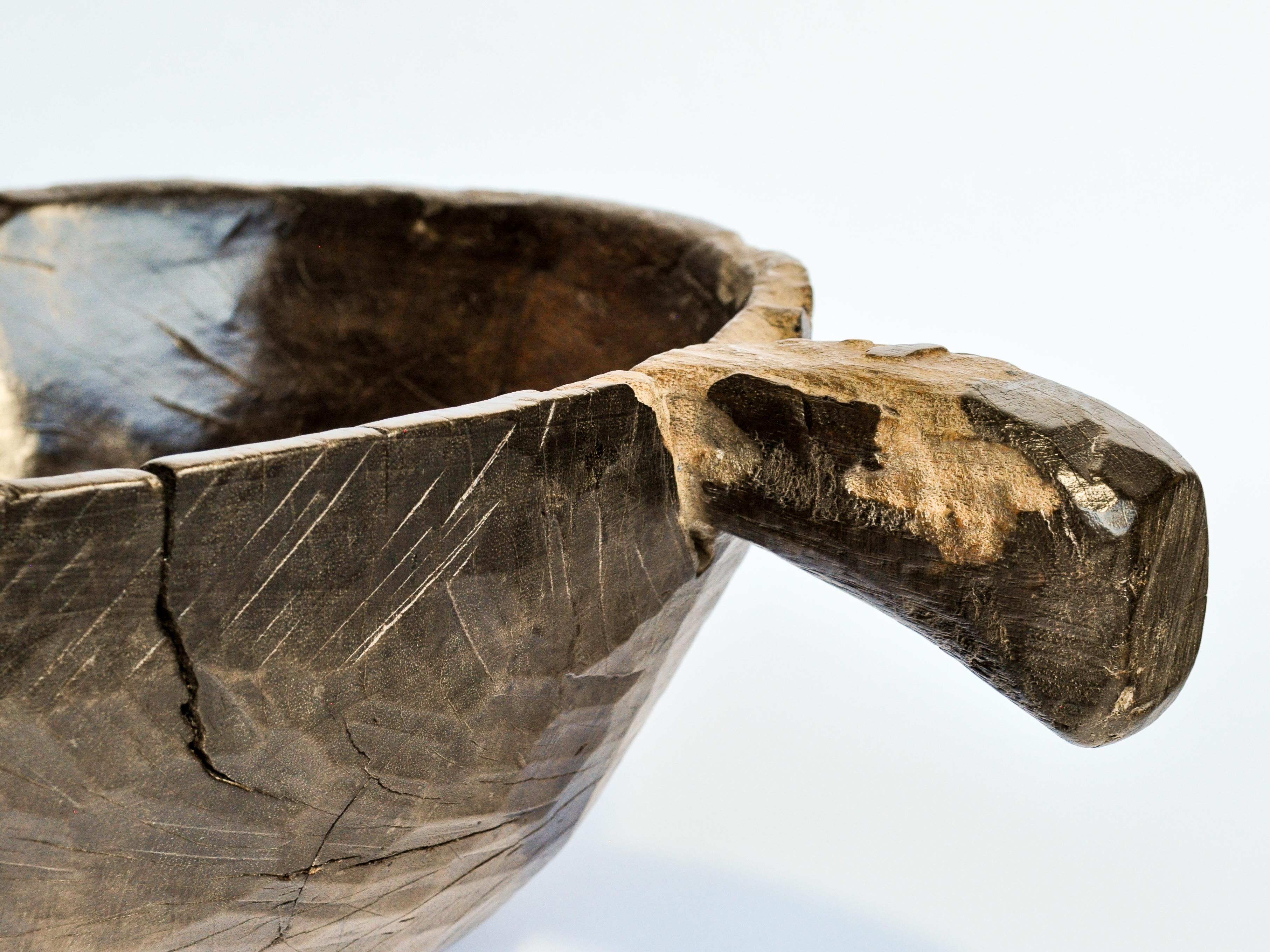 Indonesian Old Hand Hewn Wooden Bowl with Handle from Sulawesi, Indonesia, Mid-20th Century