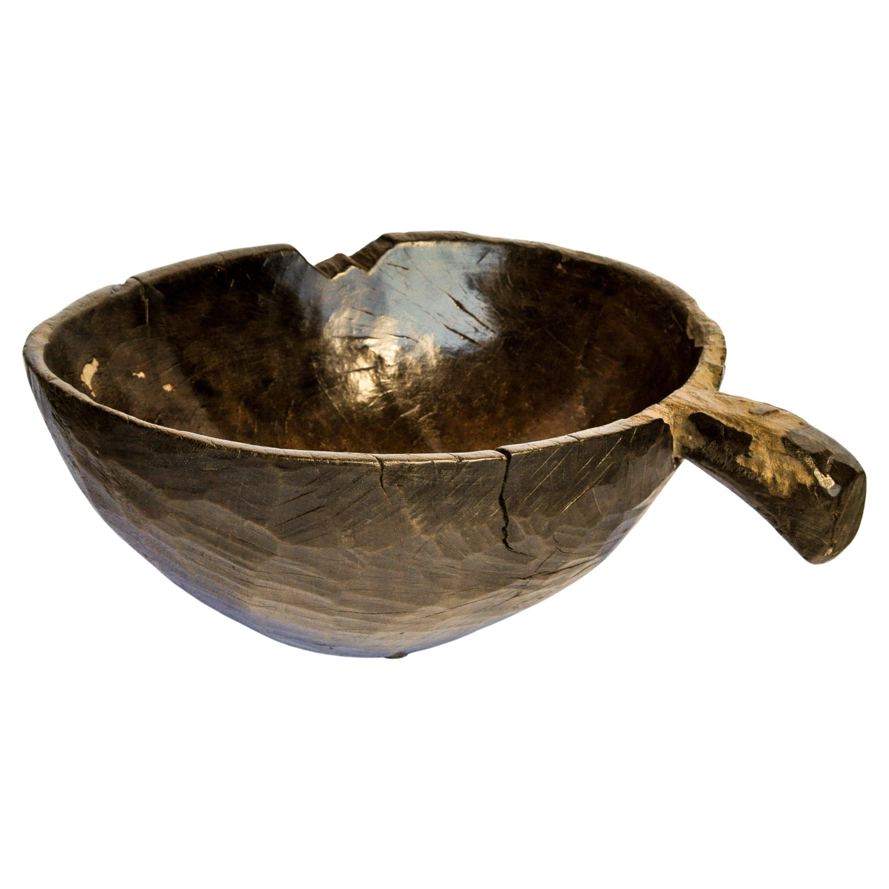 Old Hand Hewn Wooden Bowl with Handle from Sulawesi, Indonesia, Mid-20th Century