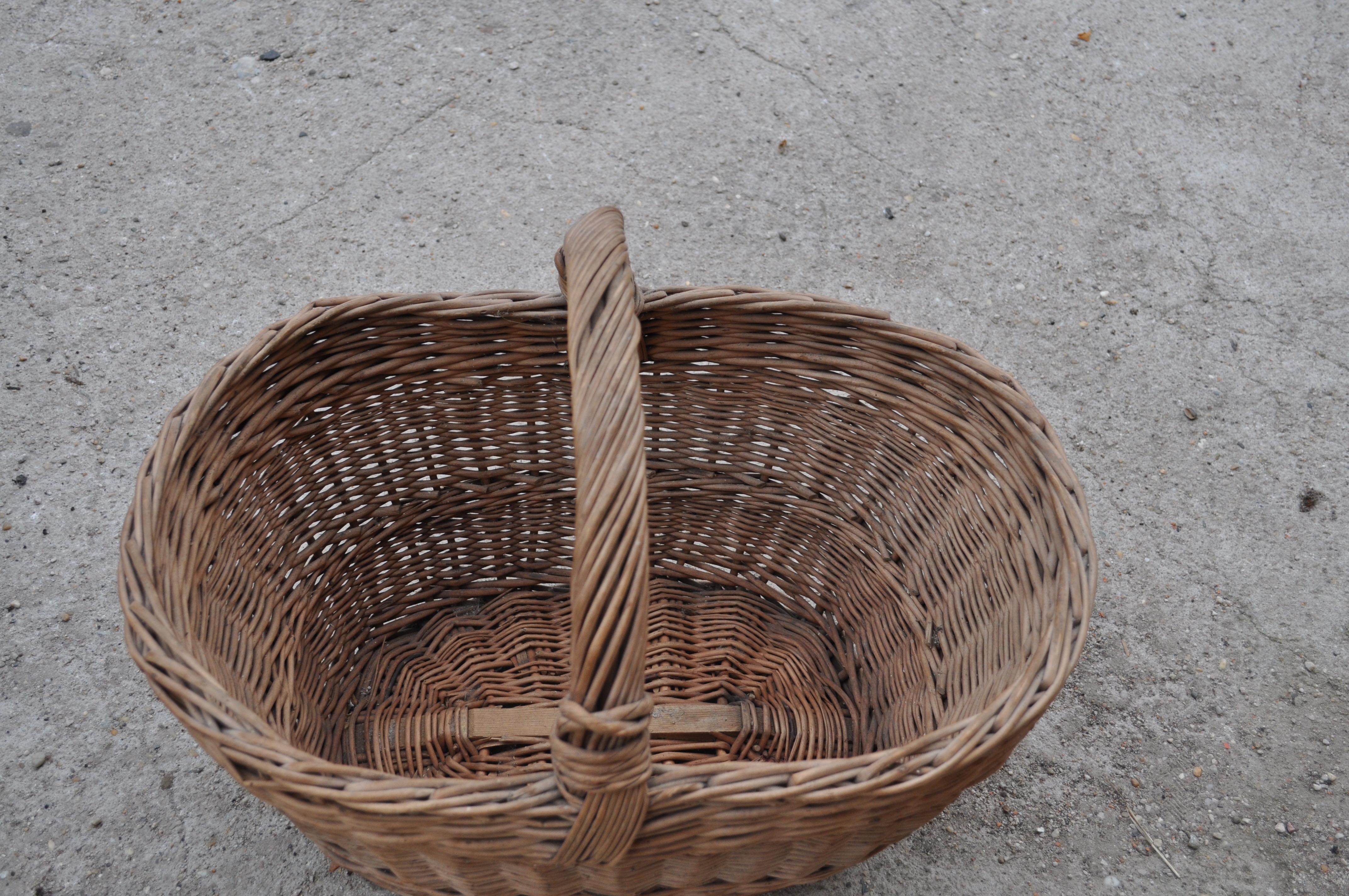 Beautiful old handwoven wicker basket. In good vintage condition. We found this in Hungary off a charming cobblestone village.
Measures: Length (Depth)18.5 in
Width 18.5 in
Height 13.78 in.