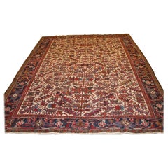 Vieux tapis Heriz avec motifs partout sur fond ivoire, vers 1920