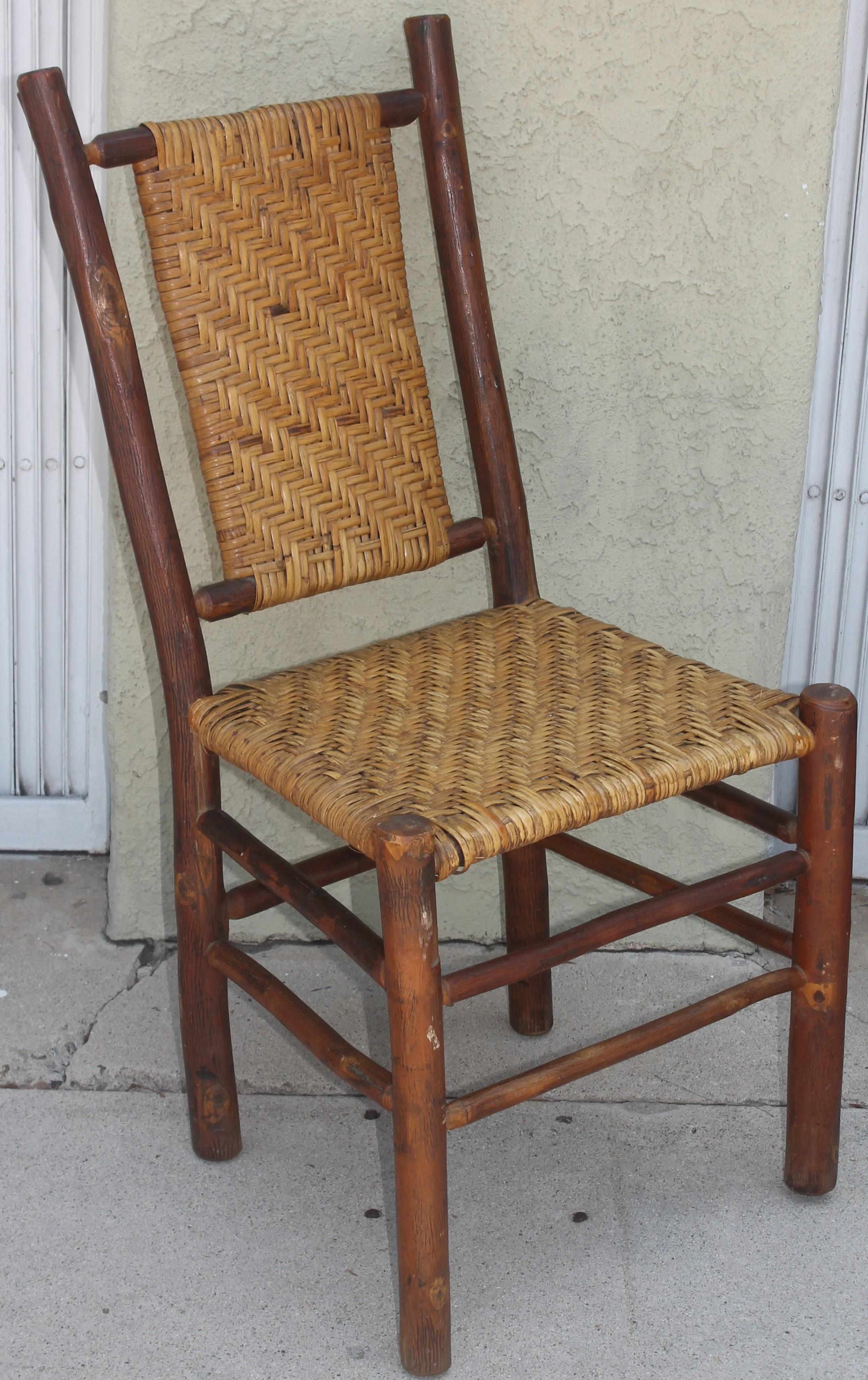 Set of four 1930's Old Hickory dining chairs. These chairs are very sturdy.