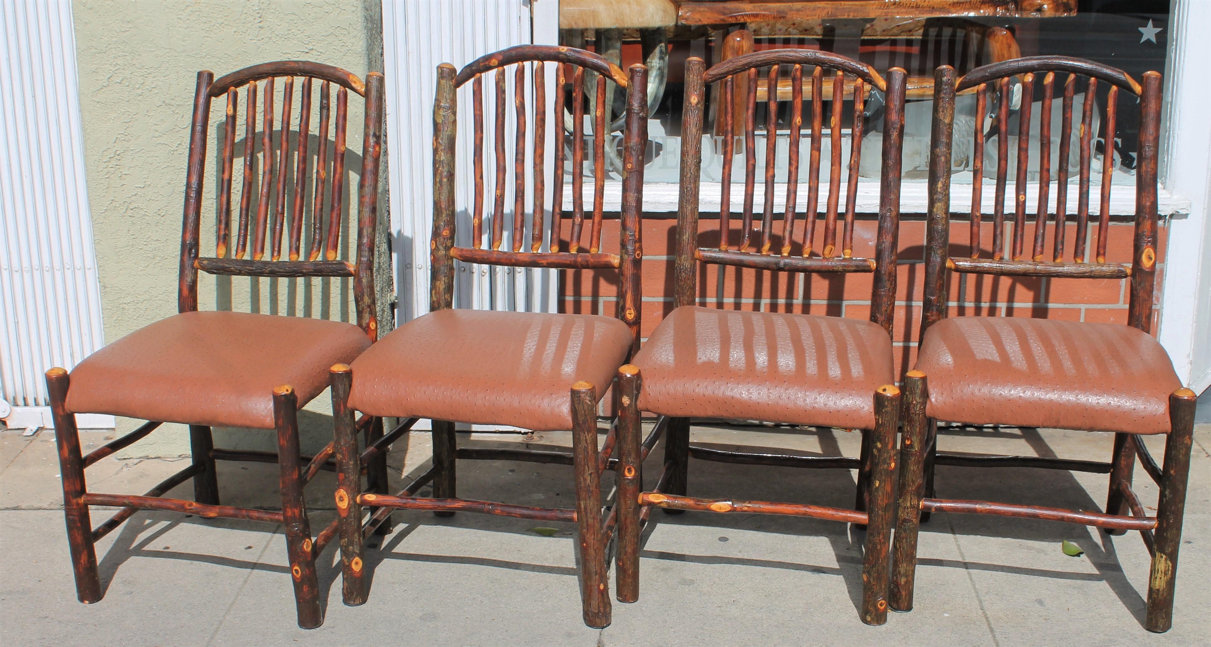 Old Hickory dinning chairs in fantastic condition. The upholstery is in a fo leather, i think man made. Condition is strong & sturdy.
