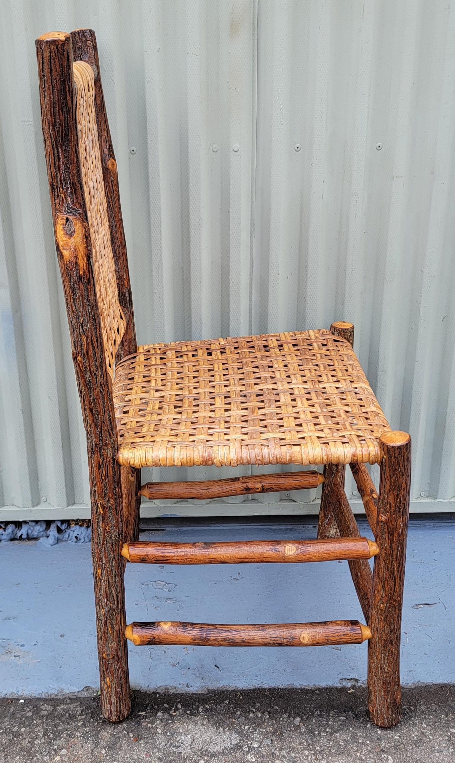 This set of fantastic Old Hickory Chairs were a custom made order for a client in Montana on a ranch and were a custom order. They were made super strong and tighter & thicker weave seats & backs. Wonderful original aged patina on the hickory. The