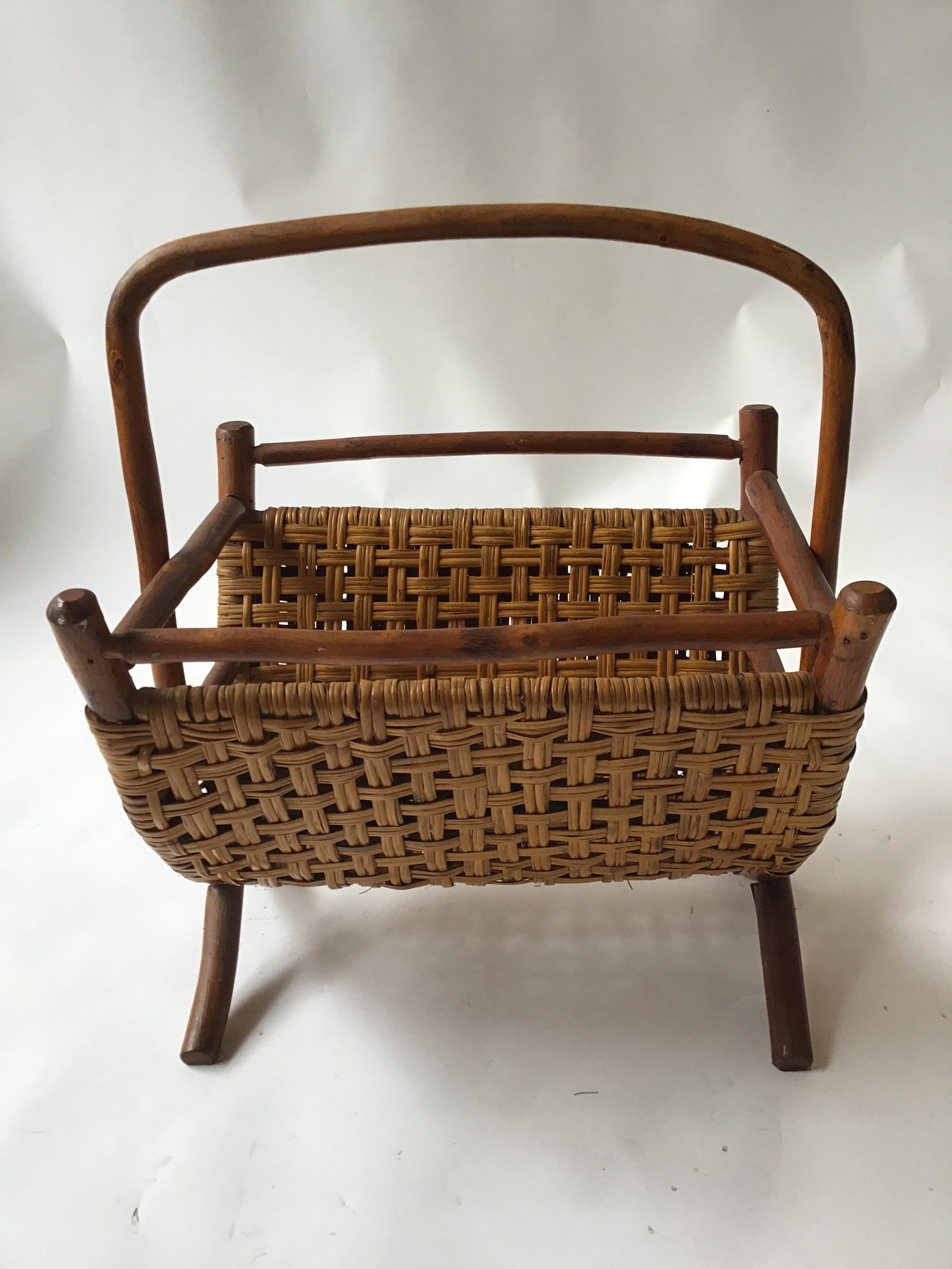 Old Hickory magazine rack. Woven splint and bent wood design.