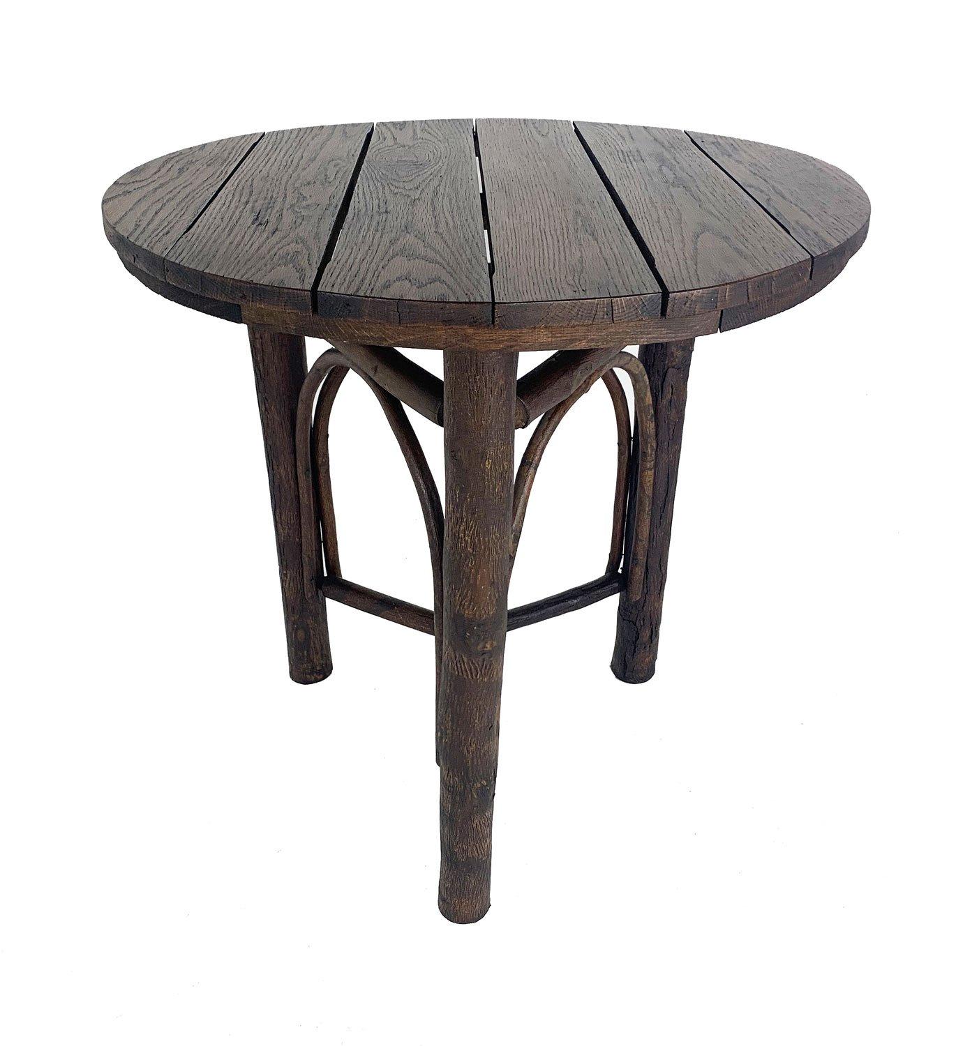 This is a classic Old Hickory table design which was offered in the earliest 1901 Old Hickory Chair Company catalog as the “Rustic 3 Leg Table” and carried throughout the decades by Old Hickory Furniture Company, Martinsville, Indiana. The hickory