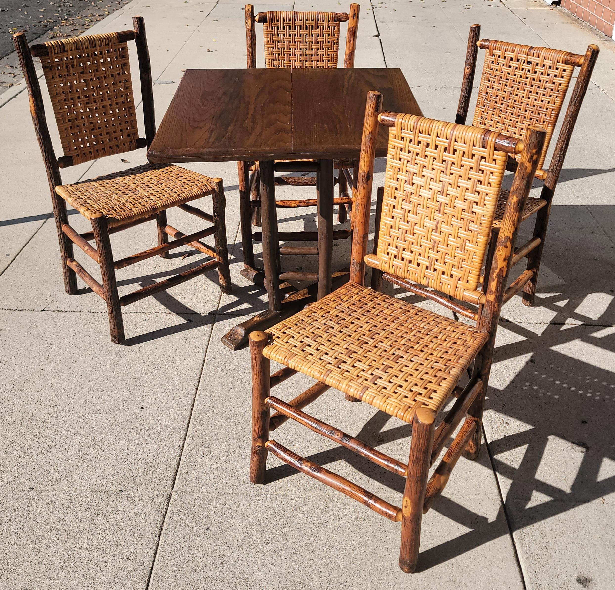 This fine table & chairs are in pristine condition. This is a put together set as you can put any chairs with this table. All pieces are in very good condition.The trestle table is most unusual in Old Hickory Furniture.

Table measures - 30 wide