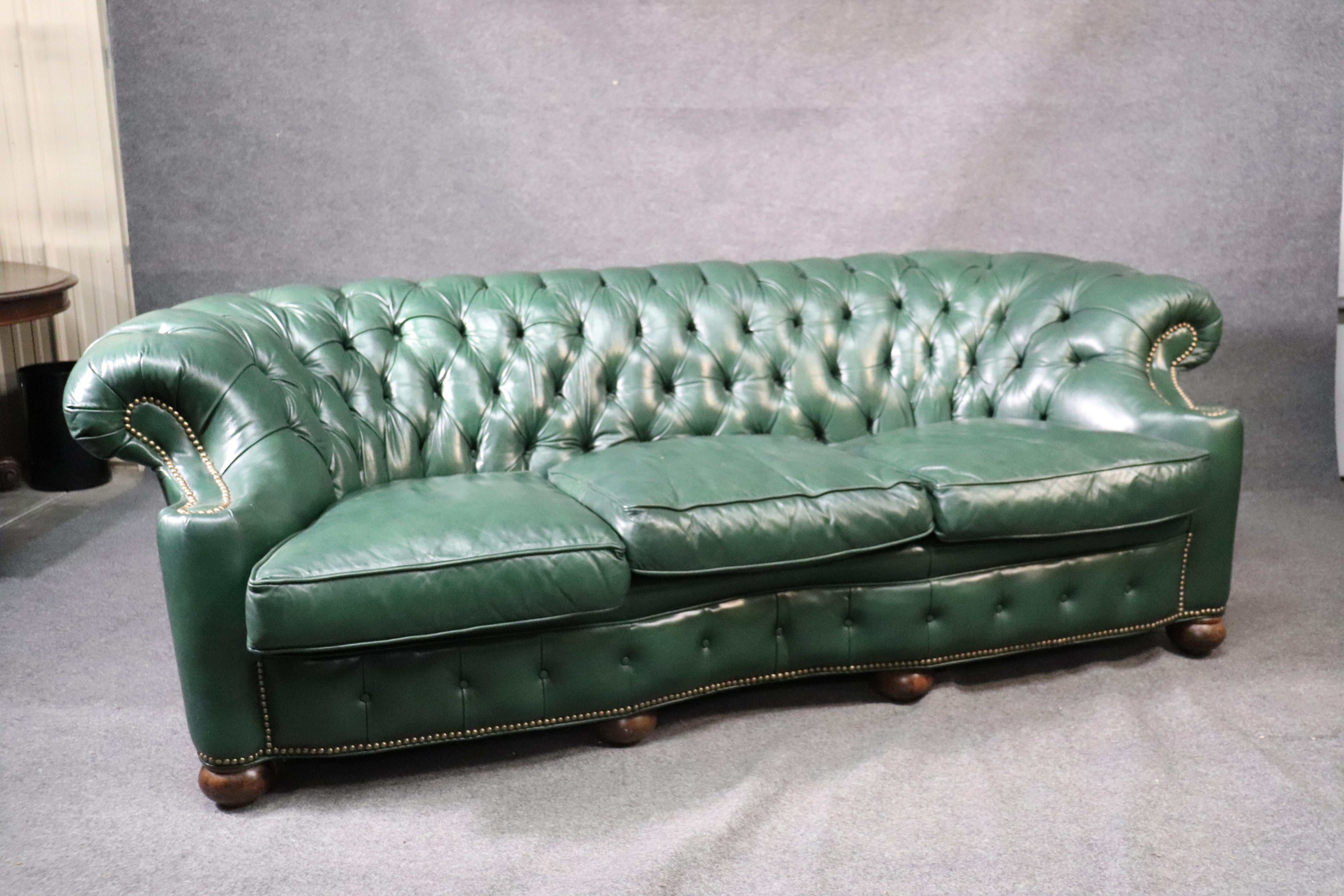 This is a gorgeous Chesterfield sofa made by Old Hickory leather company. The sofa is in very good used condition. The color is gorgeous and despite the way it appears - the cushions fit correctly. Measures: 89 wide x 39 deep x 31 tall and the seat