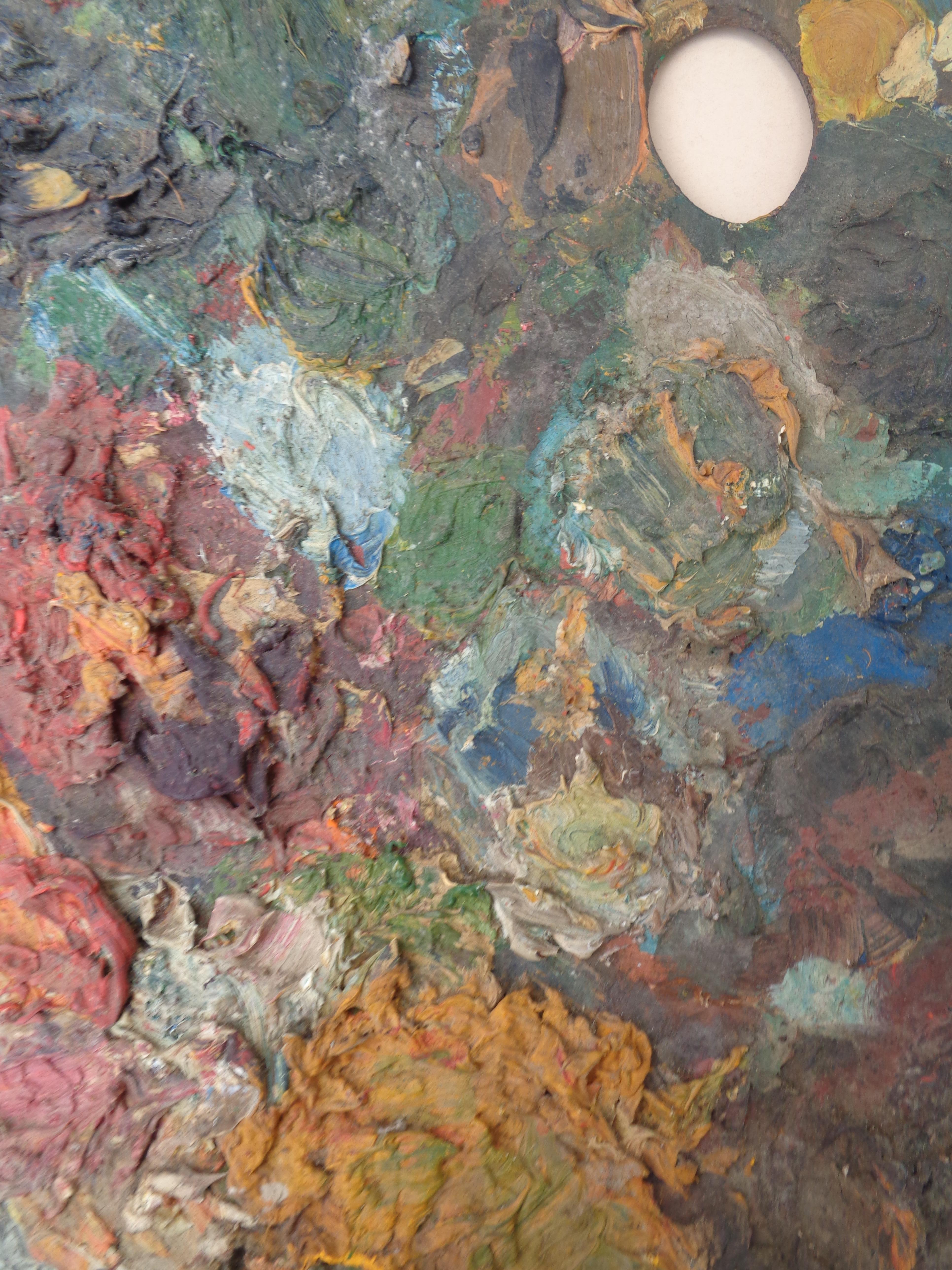 Vecchie tavolozze per artisti in legno incrostate di pittura 2