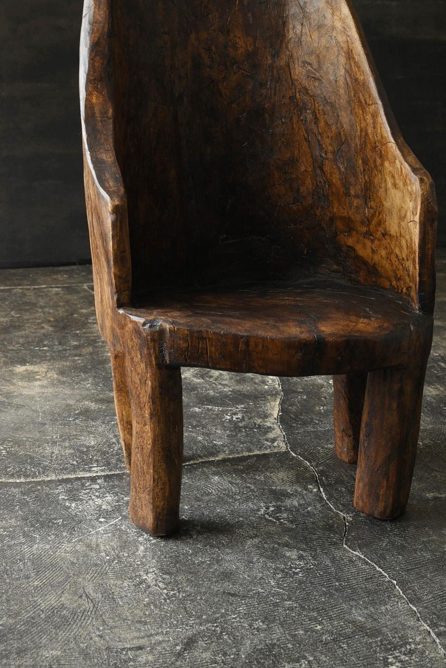 Other Old Indian wooden low chairA/20th century/Chair made from a single piece of wood For Sale