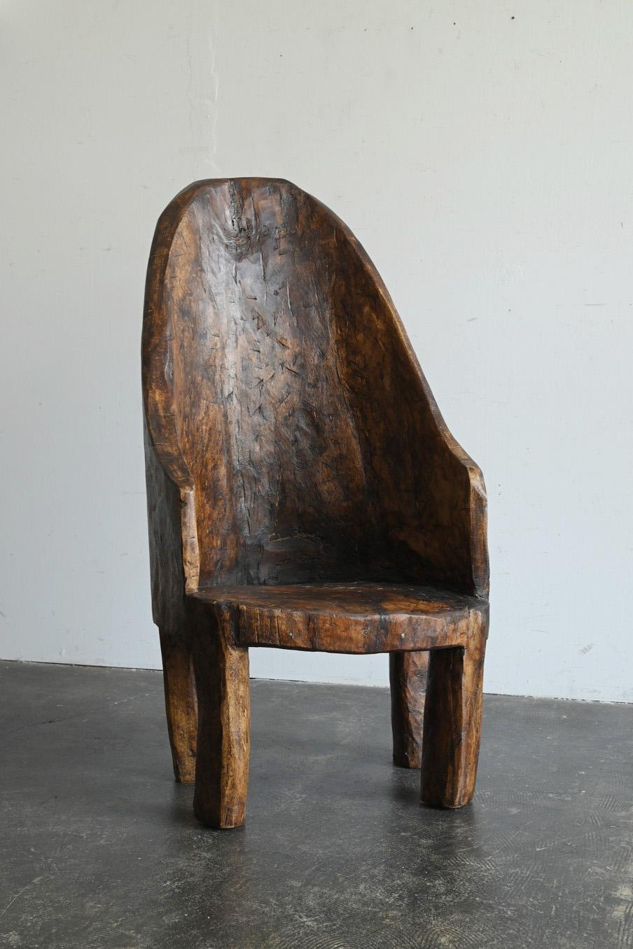 Hand-Carved Old Indian wooden low chairA/20th century/Chair made from a single piece of wood For Sale