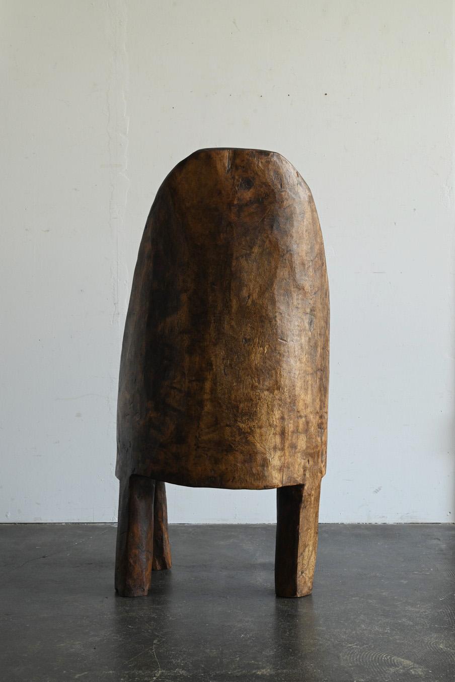 20th Century Old Indian wooden low chairA/20th century/Chair made from a single piece of wood For Sale