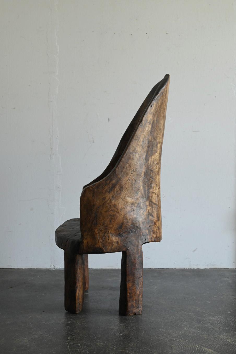 Wood Old Indian wooden low chairA/20th century/Chair made from a single piece of wood For Sale