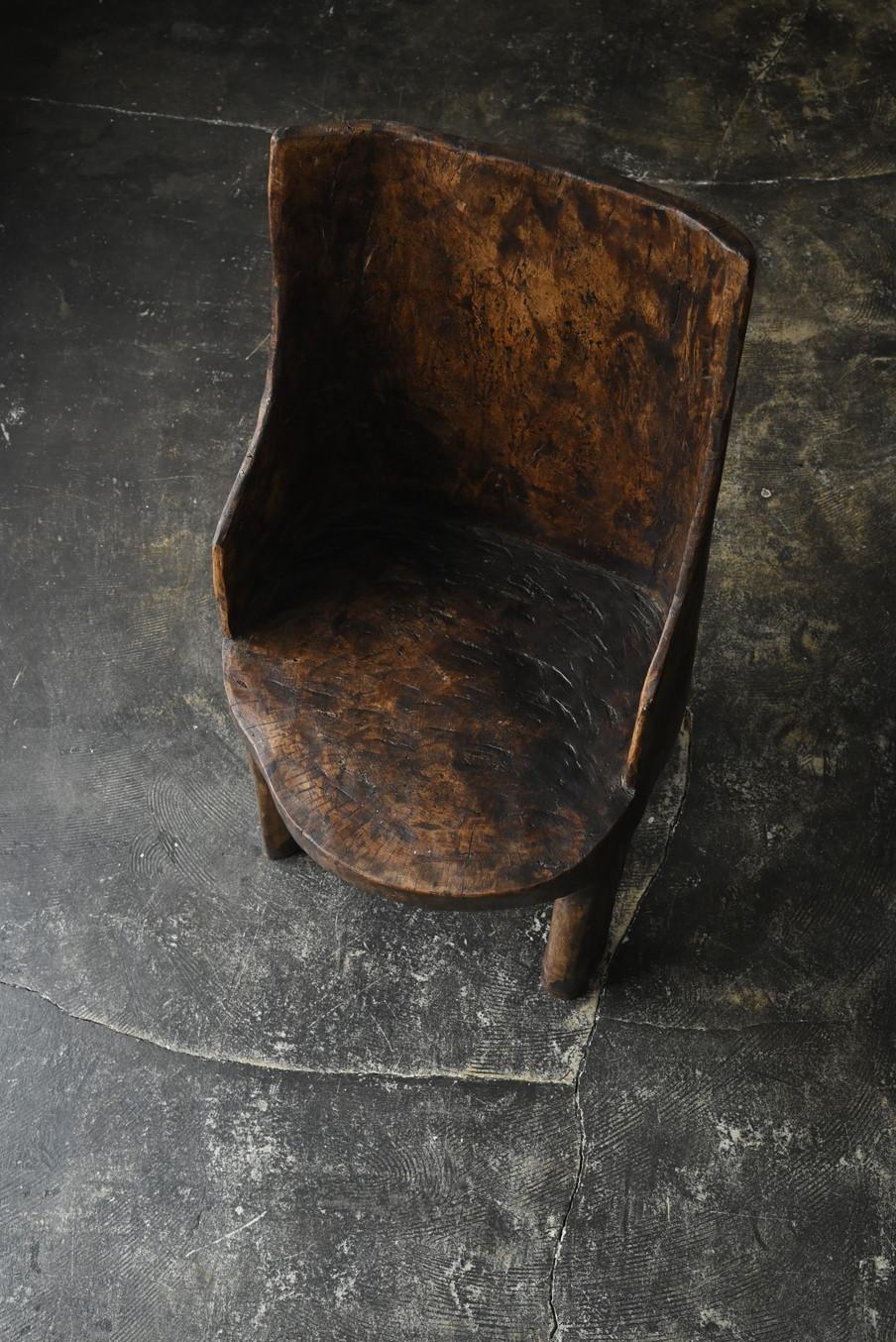Wood Old Indian wooden low chairB/20th century/Chair made from a single piece of wood For Sale