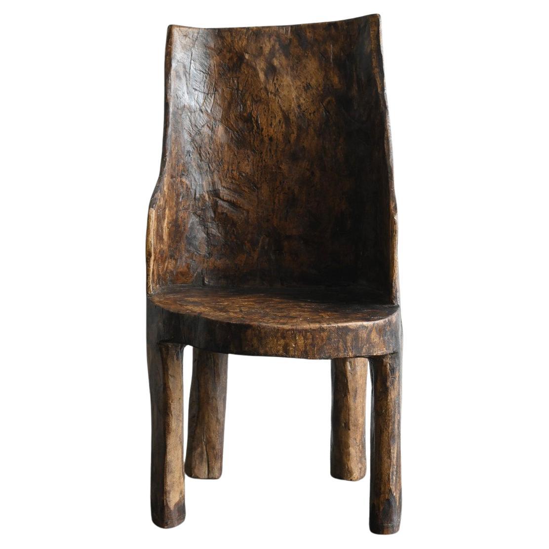Old Indian wooden low chairB/20th century/Chair made from a single piece of wood