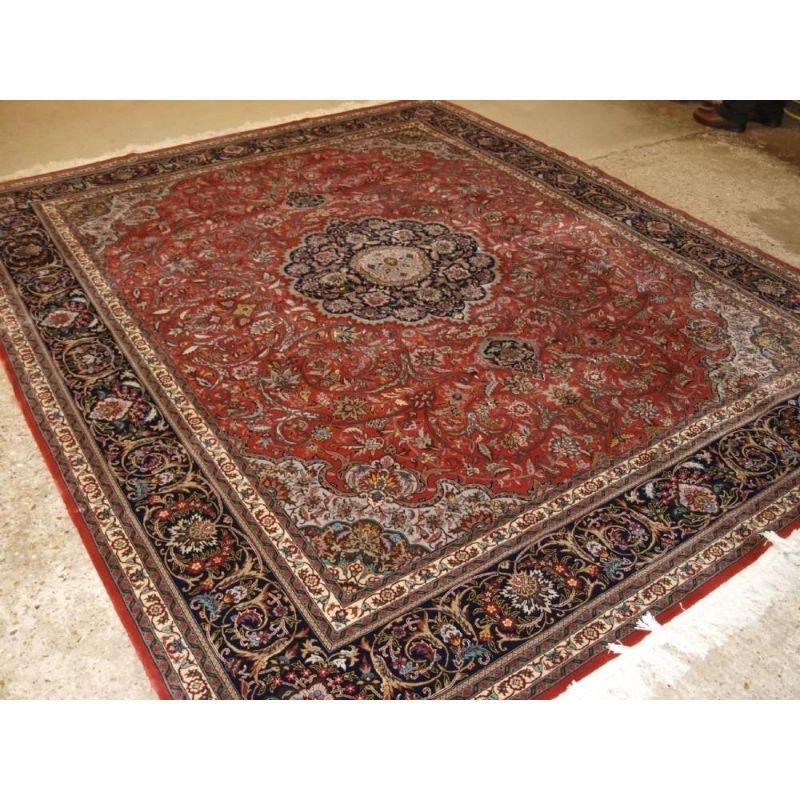 This carpet is of very fine weave with tight fine pile of lambs wool on a cotton foundation. The carpet has a velvet like feel.

The carpet has a floral design around a central medallion and has amazing detail, it is an excellent example of type.