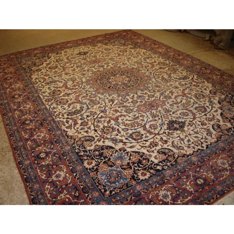 This carpet has a light ivory ground with a floral design in pastel shades. The border is an outstanding feature of this carpet, with very fine detailed drawing.

The carpet is in excellent condition with slight wear and good pile. The carpet has