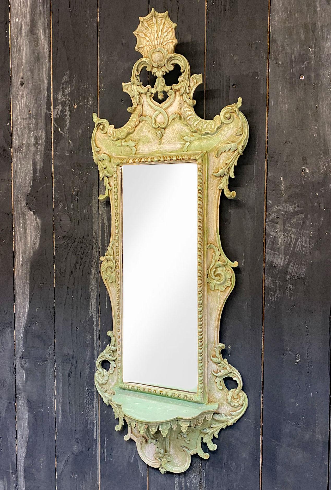 Old Italian Mirror in carved and patinated wood Circa 1900.