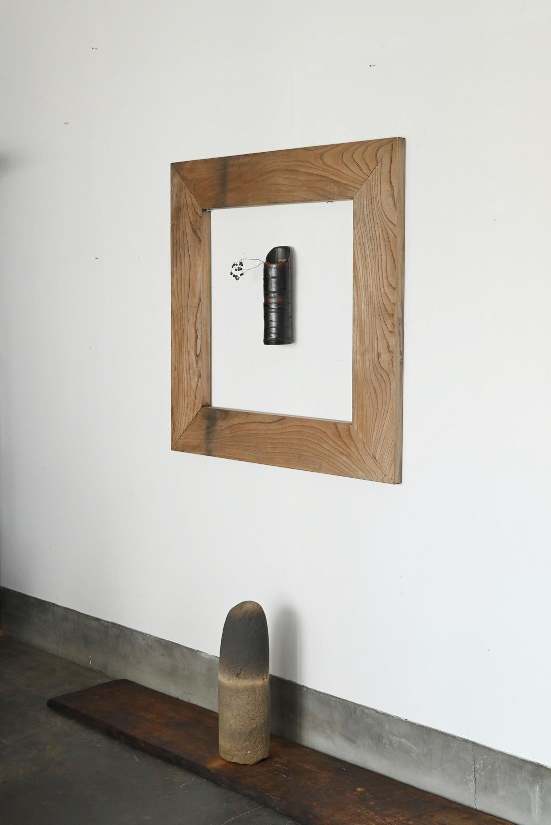 This wooden frame is crafted from ancient Japanese zelkova wood. It appears to have originally been made as a hearth edge, but was rarely used and stored for a long time. As a result, it is in excellent condition, with no significant warping or