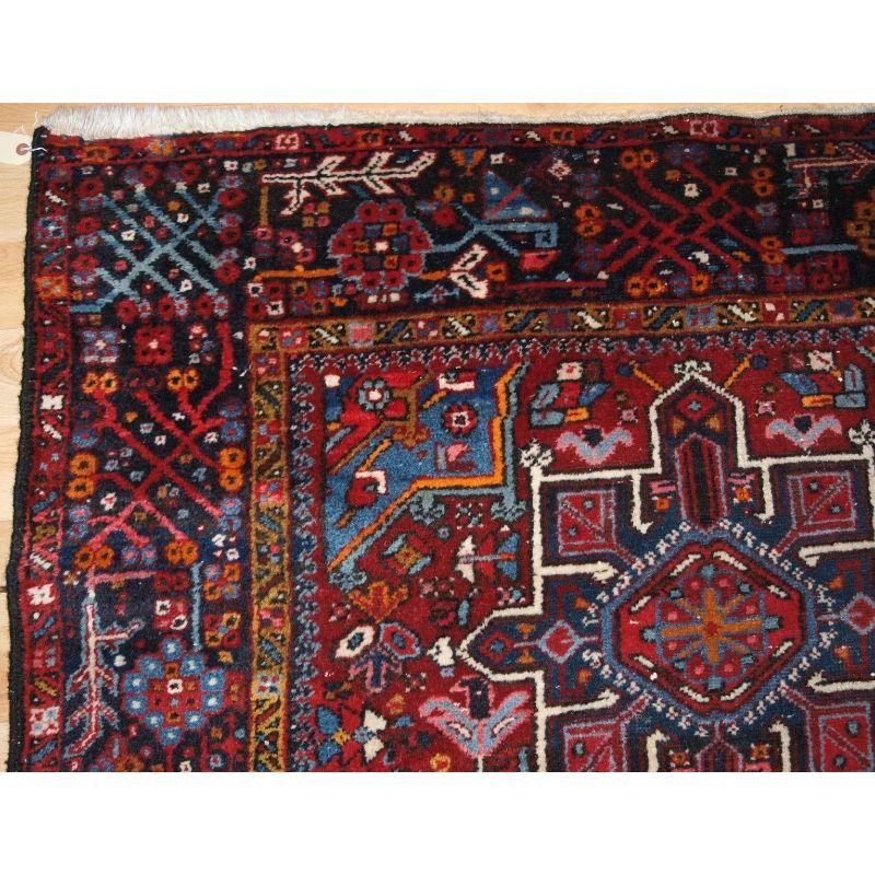 Old Karaja runner or kelleh of traditional design with seven medallions and a classic Karaja border.

The runner has thick heavy pile with good strong colours including nice blues and a mustard yellow.

The runner is in excellent condition with