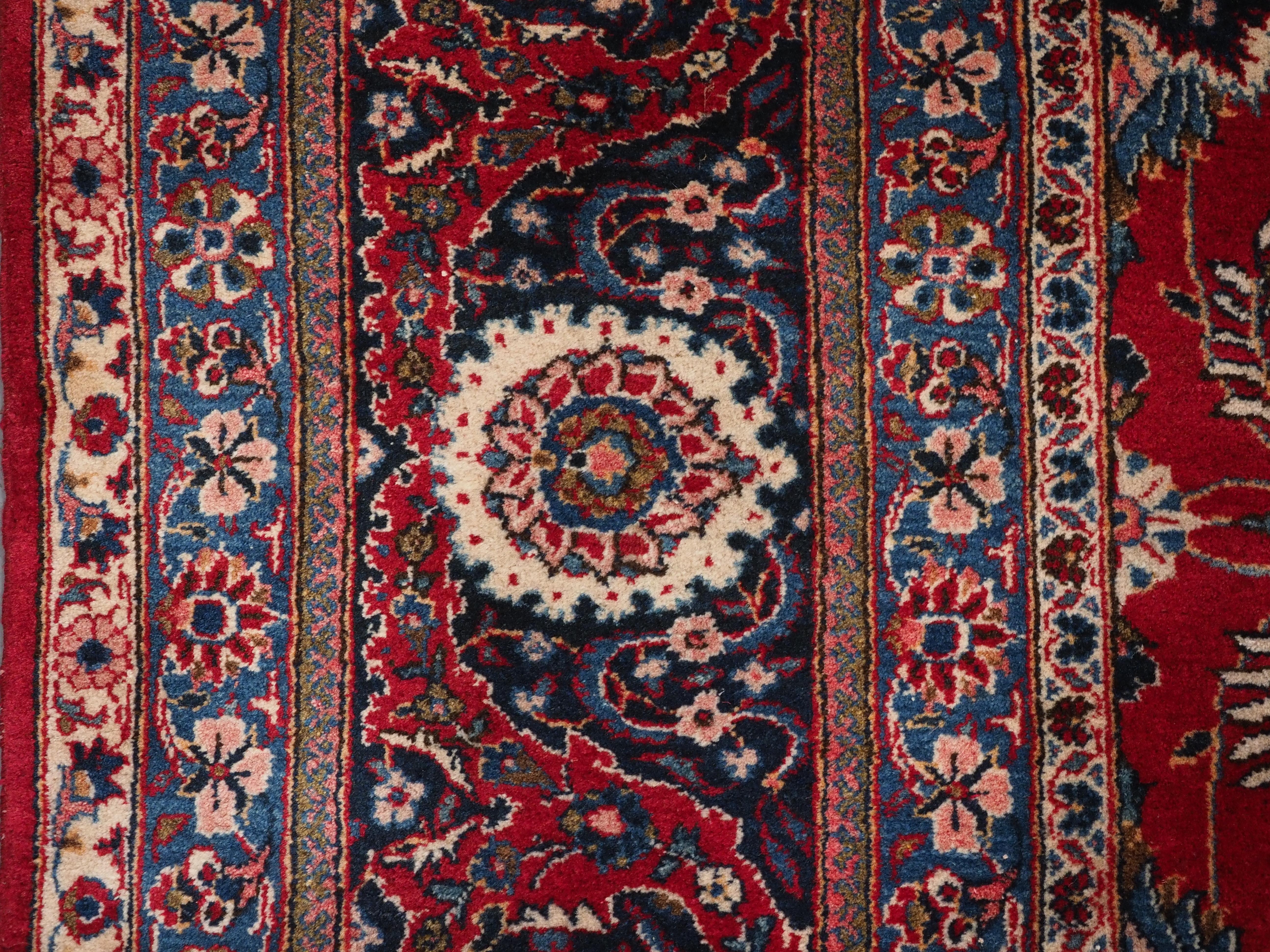 Caucasian Old Kashan carpet of classic all over design and good colour,  circa 1980. For Sale