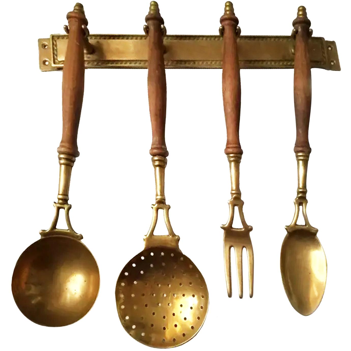 Only until the end of the year
Reasonable offers are welcome

Old kitchen tools or utensils made of brass and wood hanging from a hanging bar. Old Kitchen Appliances

Early 20th century

Saucepan fork palette and serving pot

This set of brass