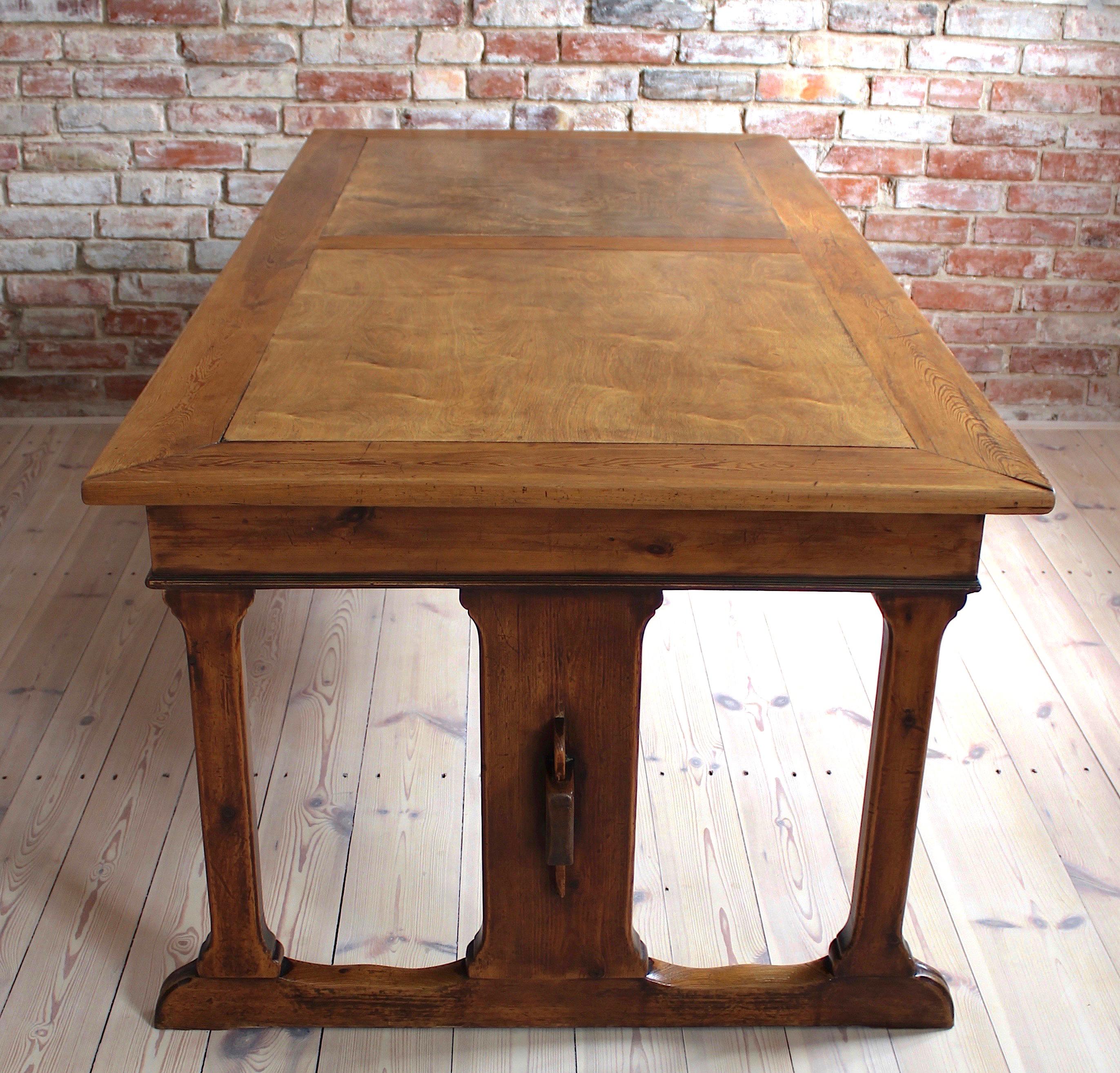 This beautiful piece of furniture served for many years as a library table. The solid oak base is very probable to be older than the beech top. The table is after a subtle renovation that allowed to preserve some historical traces of use, signs of