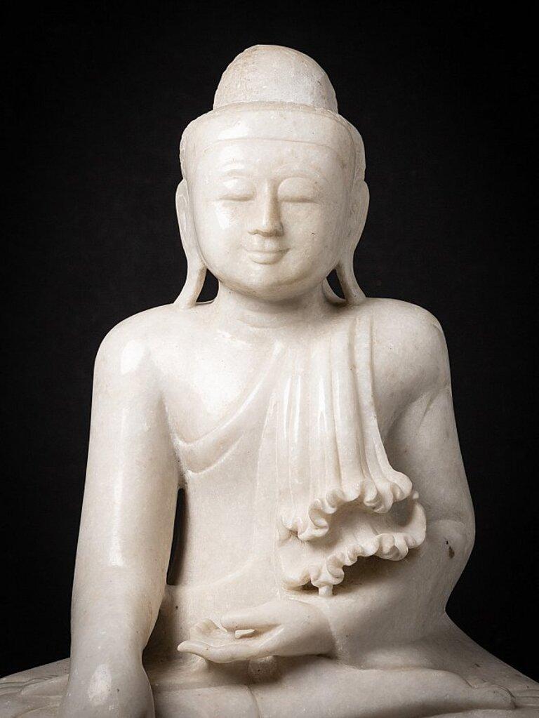 Material: marble
56 cm high 
47 cm wide and 24 cm deep
Weight: 47 kgs
Mandalay style
Bhumisparsha mudra
Originating from Burma
Mid-20th century.
 