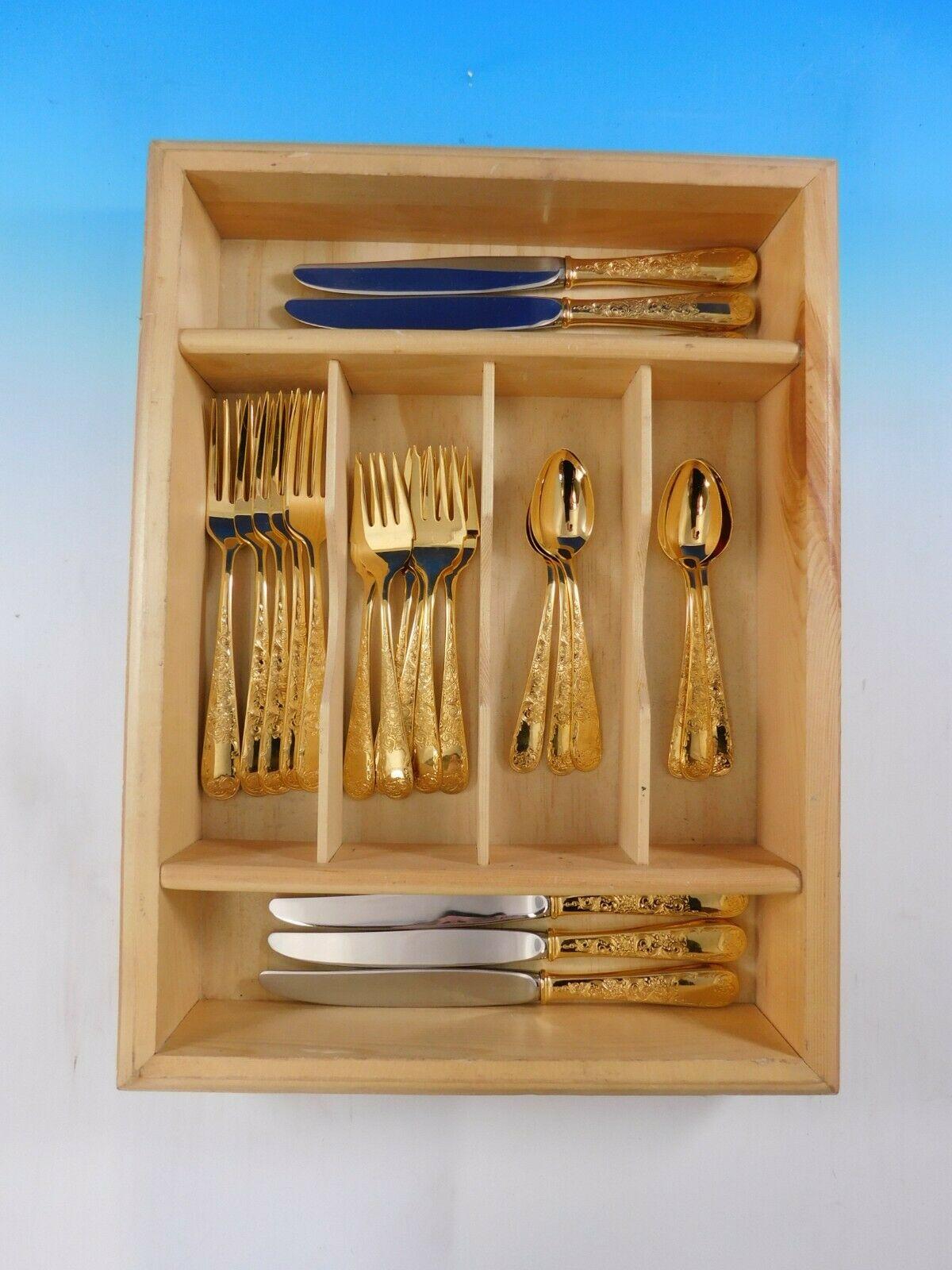 Fabulous Old Maryland engraved gold by Kirk sterling silver flatware set - 32 pieces. Gold flatware is on trend and makes a bold statement on your table. This set is vermeil (completely gold-washed) and includes:

6 knives, 8 7/8