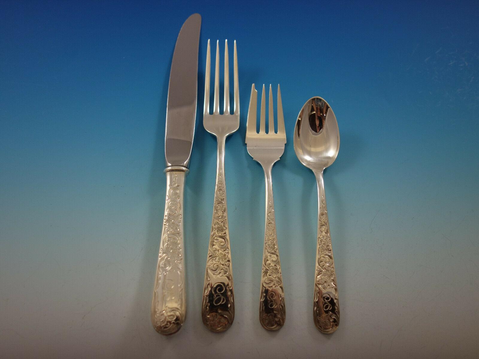 Dinner size Old Maryland Engraved by Kirk sterling silver flatware set, 62 pieces. This set includes:

8 dinner size knives, 9 5/8