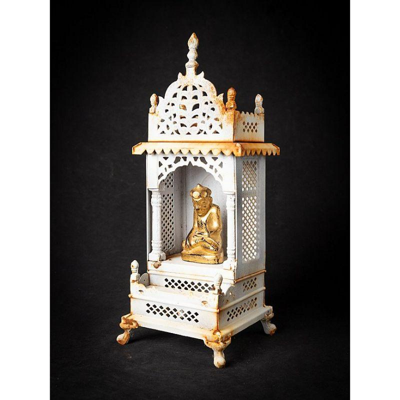 Material: metal.
Material: wood.
Measures: 37 cm high 
15, 3 cm wide and 14, 5 cm deep.
Weight: 1.192 kgs.
The shrine is originating from Nepal.
Originating from Nepal.
The Buddha is made of wood and is dating from the 19th century.

