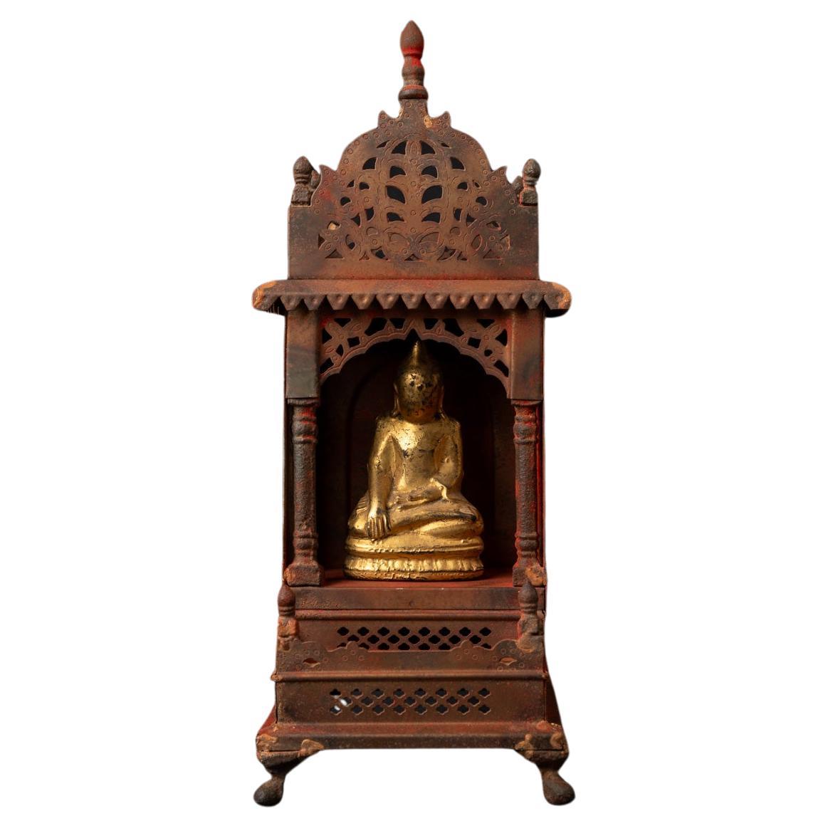 Old metal temple with antique wooden Buddha statue from Nepal For Sale