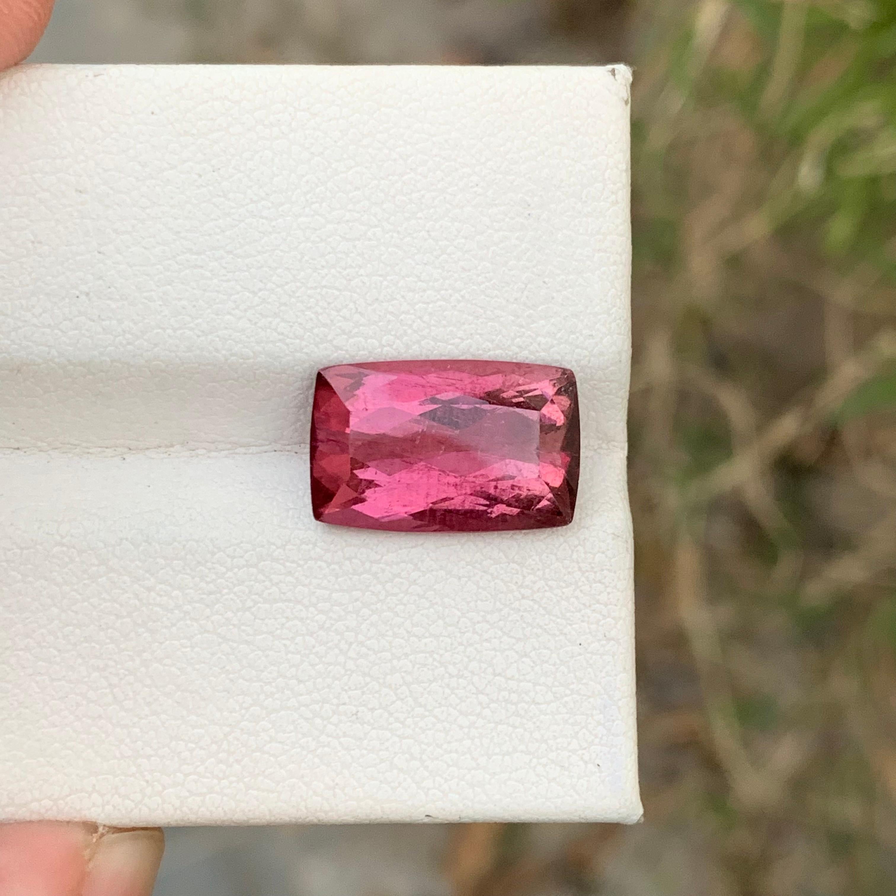 Loose Rubellite Tourmaline 
Weight: 6.90 Carats 
Dimension: 14.7x9.4x6 Mm
Origin: Africa
Shape: Can Baguette
Treatment: Non
Color: Red
Certificate: On Demand 
Rubellite tourmaline, a captivating gemstone cherished for its vibrant pink to red hues,