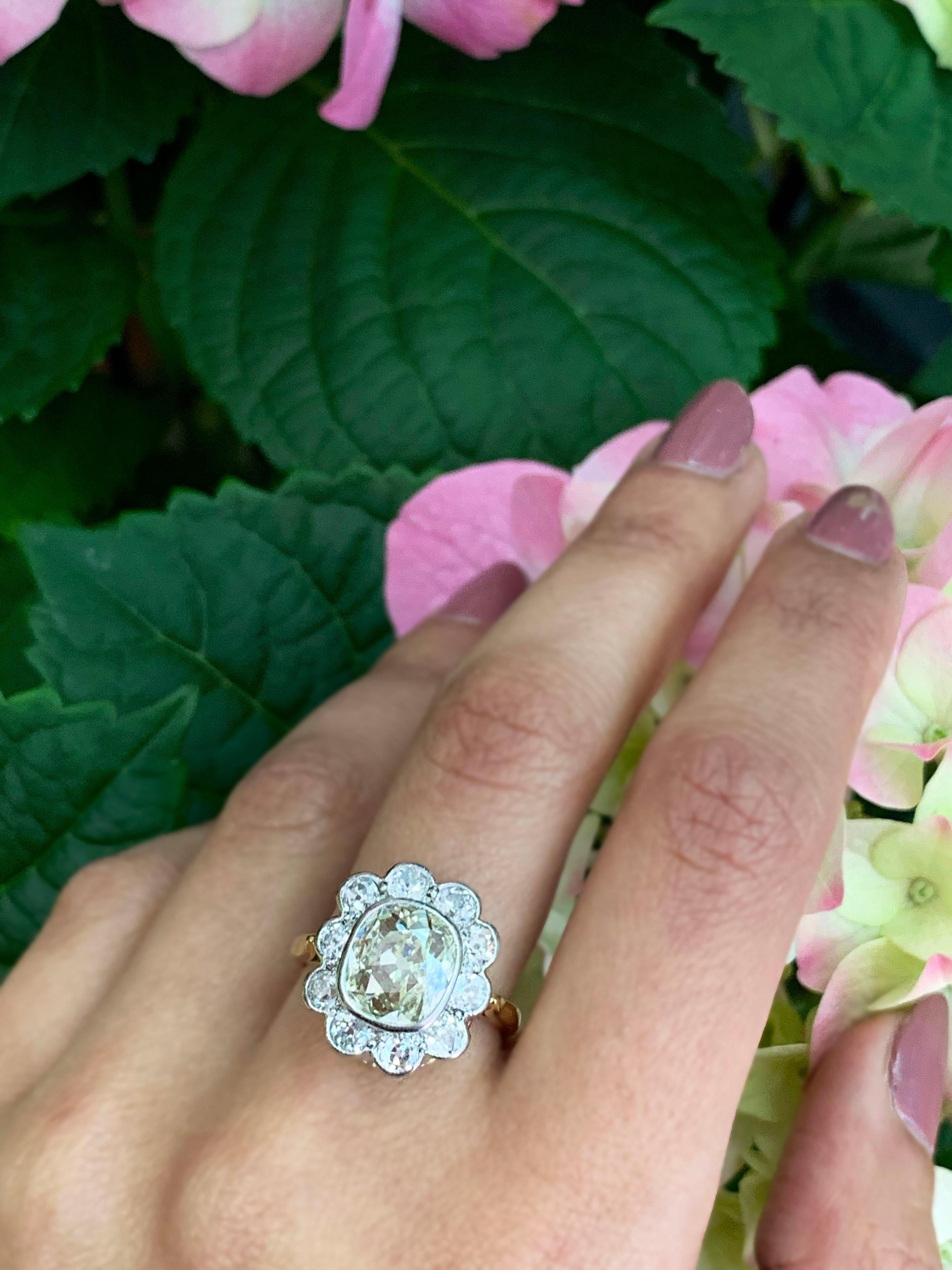 Old Mine Cushion Cut Diamond Cluster Engagement Ring In Excellent Condition In London, GB