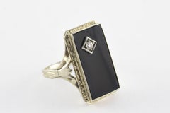 Diamant- und Onyxring im Minenschliff
