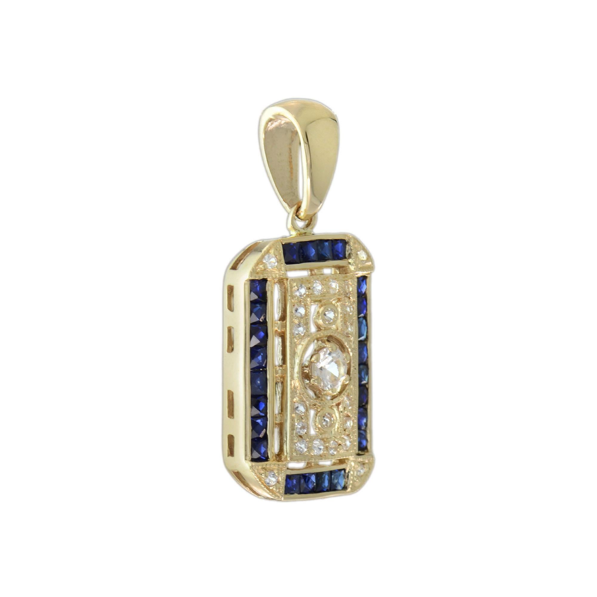 Stunning Antique inspired diamond and sapphire drop pendant. Bezel set in the center is an old cut diamond of approx. 0.11 carat. The outer columns are adorned with a beaded design. Framing the entire design are narrow French cut baguette shaped