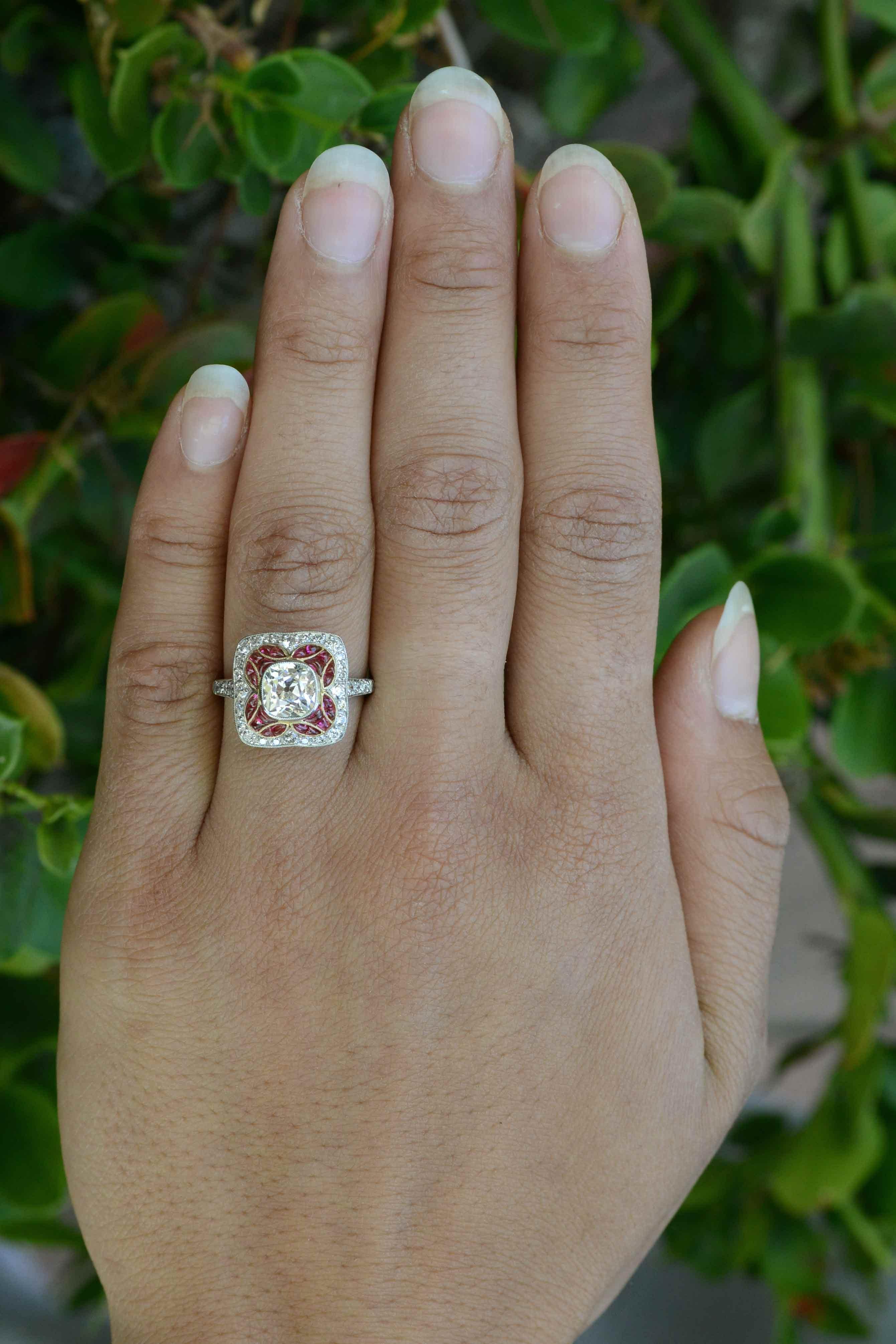 An exciting old mine cut diamond & ruby cocktail ring in a timeless Art Deco style, with a micro mosaic bombe' dome that is most mesmerizing and detailed. Centered by a juicy, 1.25 carat, 100 year old cushion cut with large, chunky facets, it
