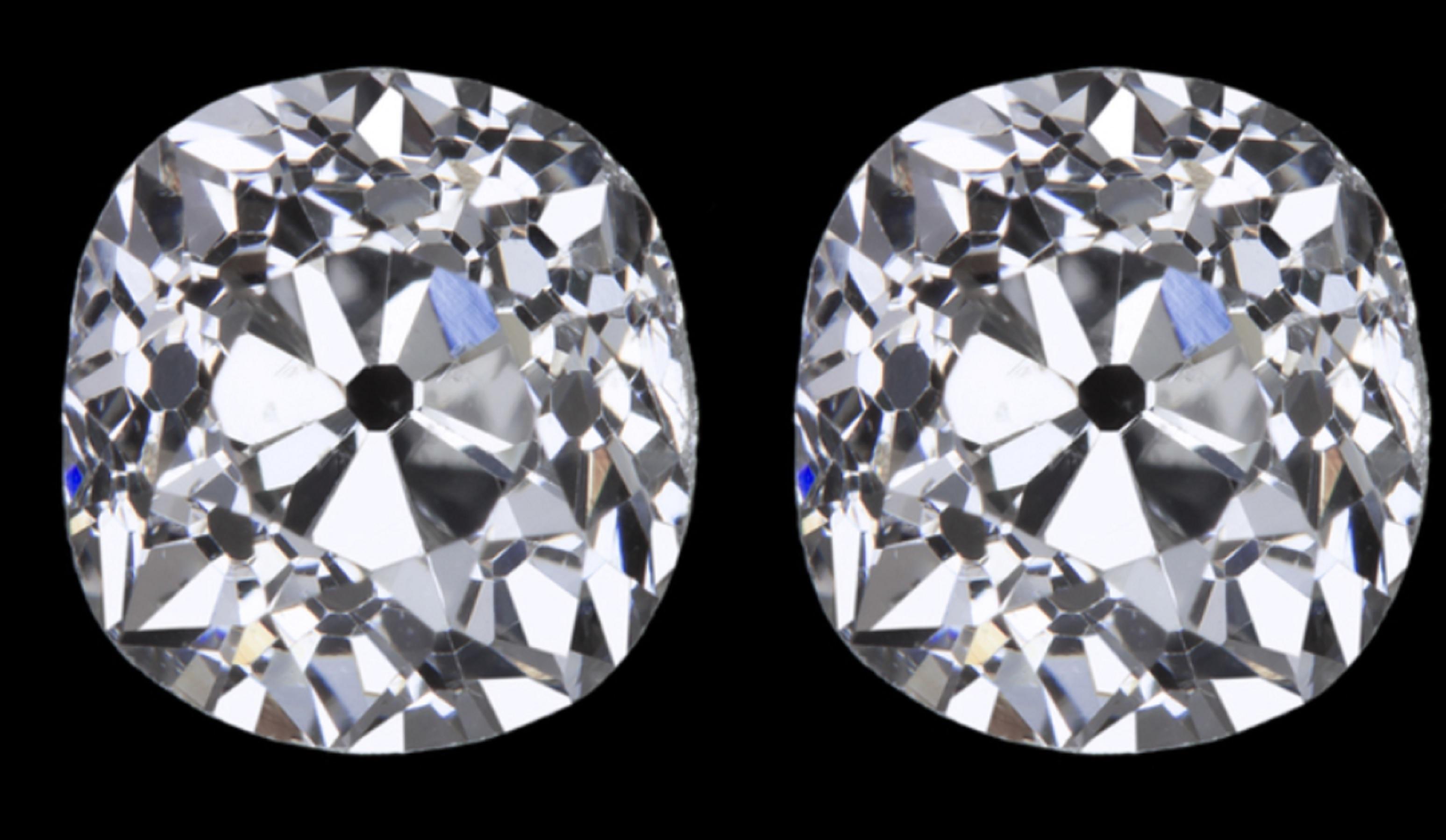 This one of a kind pair of Old European cut diamonds is impressive in size, eye clean in the ear, beautifully white, and truly dazzling with fiery sparkle! Absolutely unique, these beauties are a perfect choice for a beautiful and meaningfully