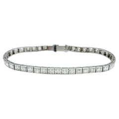 Altes Minenschliff-Diamant-Tennisarmband mit quadratischem Milgrain-Design aus Platin