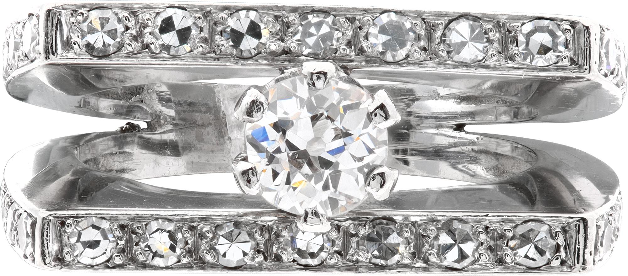 Old Mine cut diamond ring set in 14K white gold. Center diamond approx. 0.70 ct., estimate: I color VS clarity. Total approx. single cut diamonds weight over 1.10 carat  Size 6.50

This Diamond ring is currently size 6.5 and some items can be sized