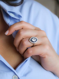 Old mine cut marquise diamond 2.1 ct Art Deco ring set with calibrated sapphires