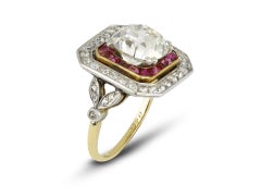 Old mine diamond and ruby target ring, circa 1920.